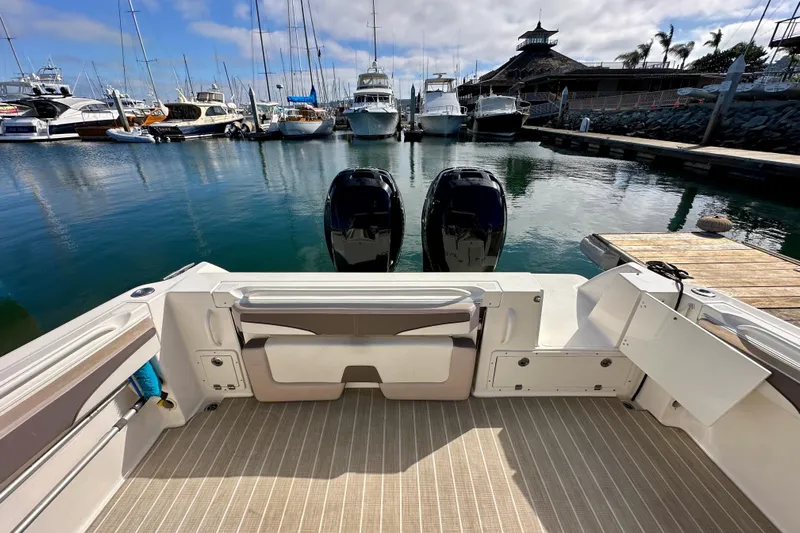 Seahorse Yacht Photos Pics 2018 Wellcraft 290 Coastal boat docked at marina with twin engines.