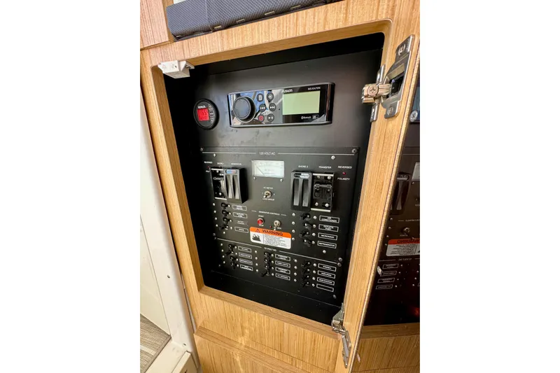 Seahorse Yacht Photos Pics Electrical control panel inside 2018 Wellcraft 290 Coastal boat, featuring switches and displays.
