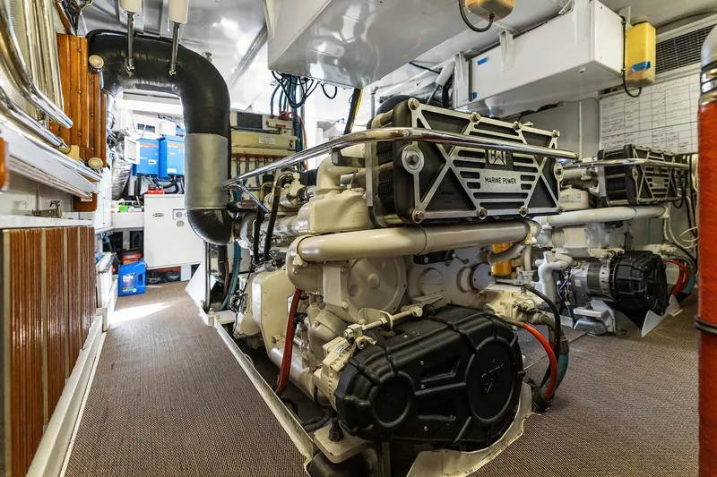 Jade Panama Yacht Photos Pics Engine room of a 2001 Rayburn Flush Deck yacht, featuring marine power systems.