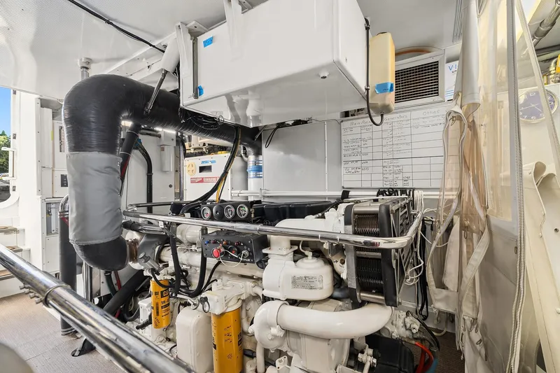 Jade Panama Yacht Photos Pics Engine room of 2001 Rayburn Flush Deck yacht, showcasing detailed machinery and equipment.