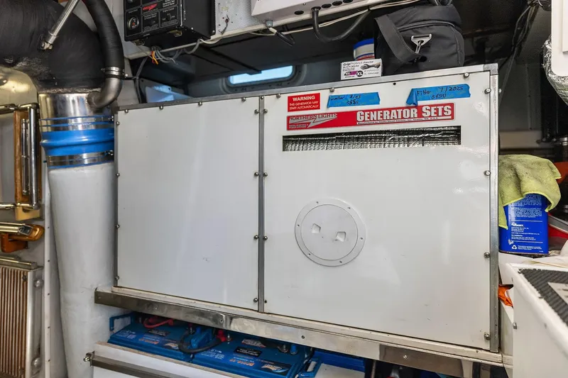 Jade Panama Yacht Photos Pics Engine room of 2001 Rayburn Flush Deck with Northern Lights generator set.