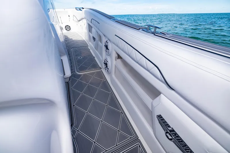  Yacht Photos Pics 2024 Deep Impact 399 Sport boat interior with sleek design and ocean view.