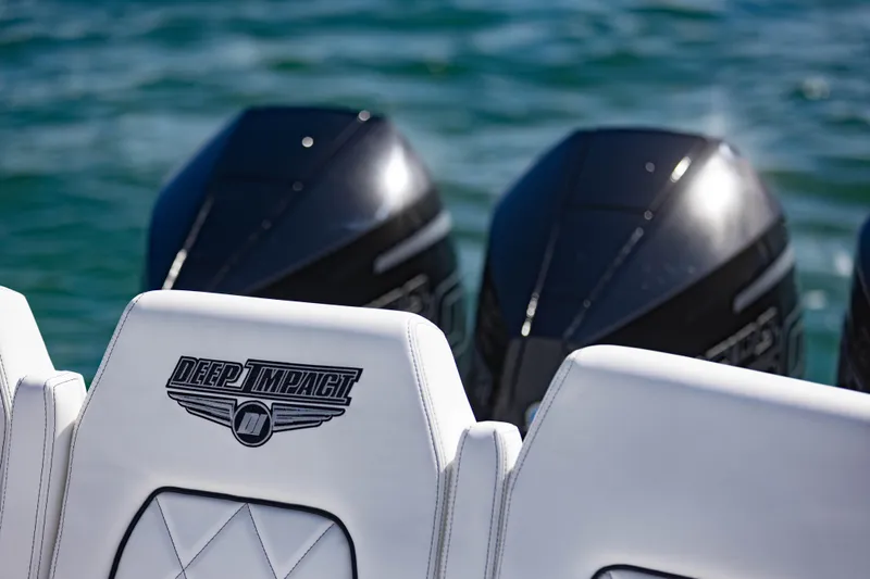  Yacht Photos Pics 2024 Deep Impact 399 Sport boat with powerful engines on water.