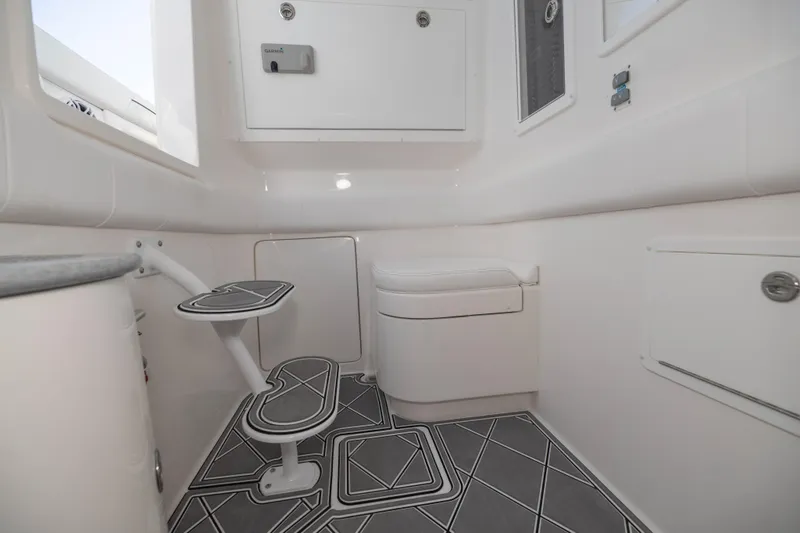  Yacht Photos Pics 2024 Deep Impact 399 Sport boat interior with modern bathroom design.