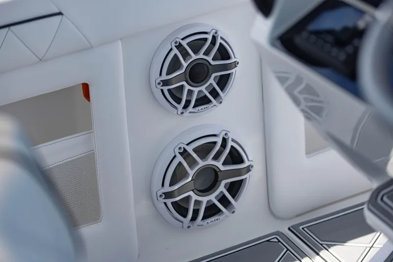  Yacht Photos Pics 2024 Deep Impact 399 Sport boat speakers, featuring sleek white design and modern audio technology.