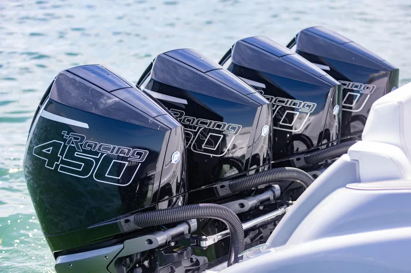  Yacht Photos Pics Four powerful outboard motors on a 2024 Deep Impact 399 Sport boat.