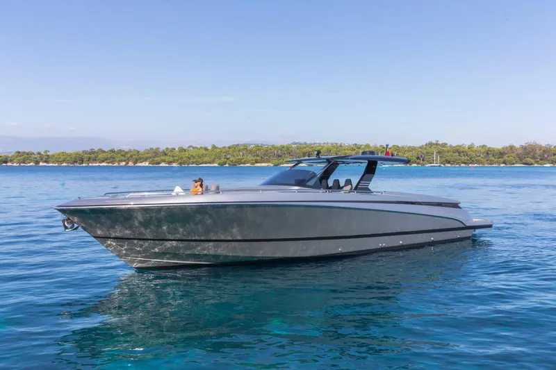  Yacht Photos Pics 2026 Canados 493 Grand yacht cruising on clear blue water.