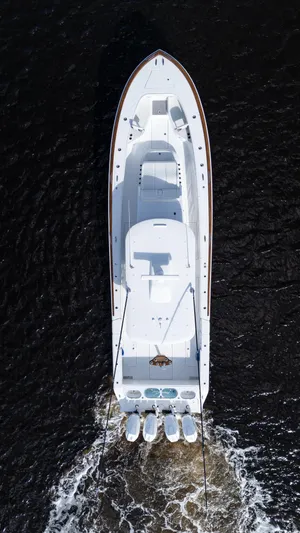  Yacht Photos Pics Aerial view of 2026 Front Runner 47 Center Console boat cruising on water.