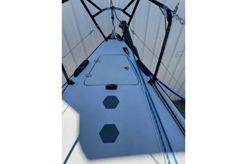 Dark Storm Yacht Photos Pics 2019 J Boats J/121 deck with rigging and hatch, showcasing sleek design.