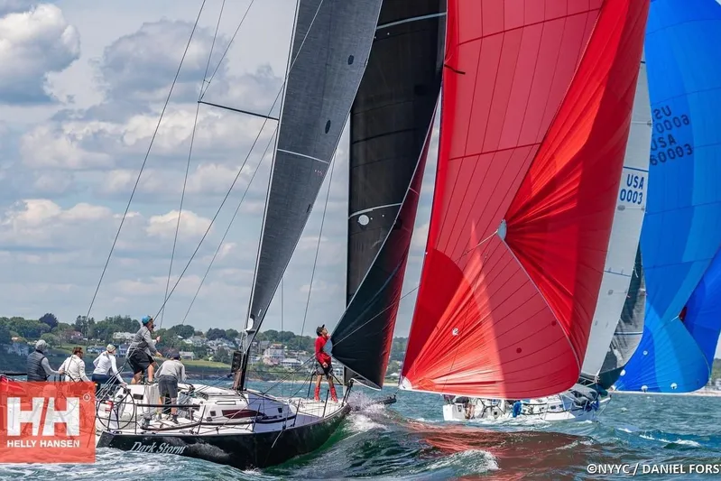 Dark Storm Yacht Photos Pics Sailboats racing with colorful spinnakers, featuring a 2019 J Boats J/121 model.