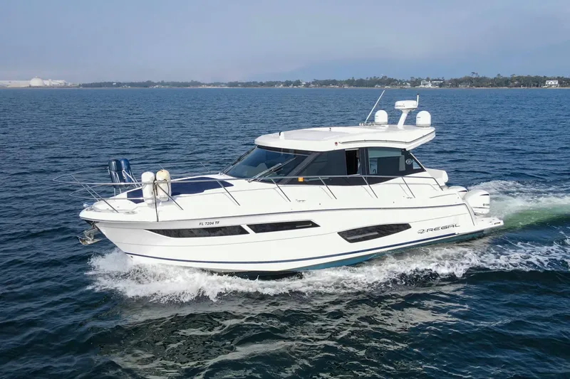  Yacht Photos Pics 2020 Regal 38 XO yacht cruising on open water.