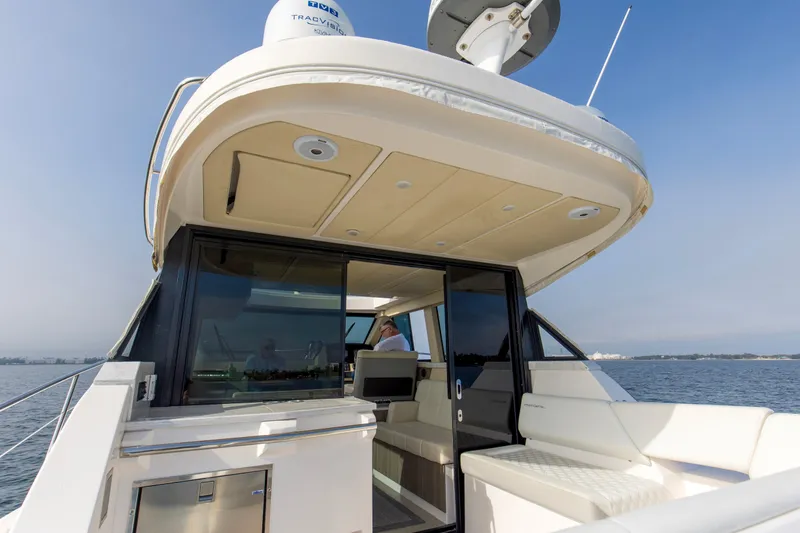  Yacht Photos Pics 2020 Regal 38 XO yacht with sleek design, spacious deck, and modern amenities on open water.
