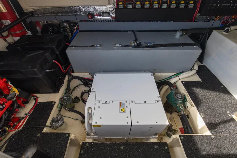  Yacht Photos Pics Engine compartment of 2020 Regal 38 XO boat, showcasing electrical and mechanical components.