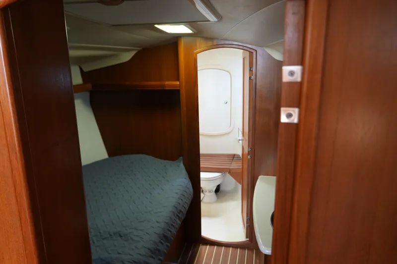 Marabelle Yacht Photos Pics Interior of 2005 Hunter 41 AC yacht showing cabin and bathroom.