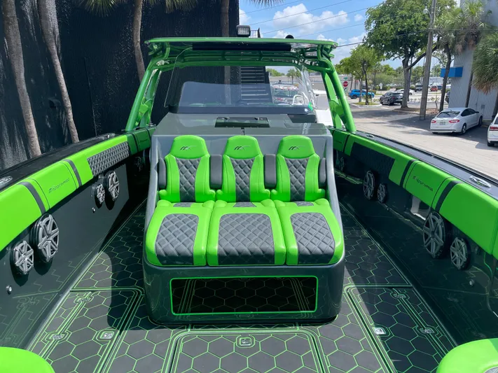  Yacht Photos Pics Midnight Express 2020 model boat with green and black interior seating.