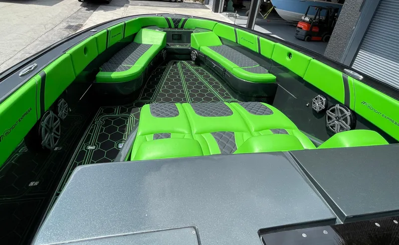  Yacht Photos Pics 2020 Midnight Express boat with vibrant green and black interior seating.