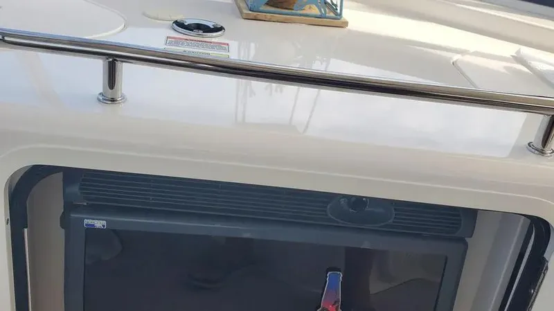  Yacht Photos Pics 2007 Sea Ray 580 Sedan Bridge interior detail with fridge and railing.