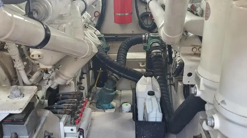  Yacht Photos Pics Engine room of 2007 Sea Ray 580 Sedan Bridge with visible components and fire extinguisher.