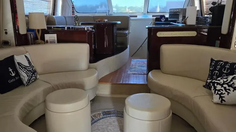  Yacht Photos Pics Luxurious interior of 2007 Sea Ray 580 Sedan Bridge yacht with elegant seating.