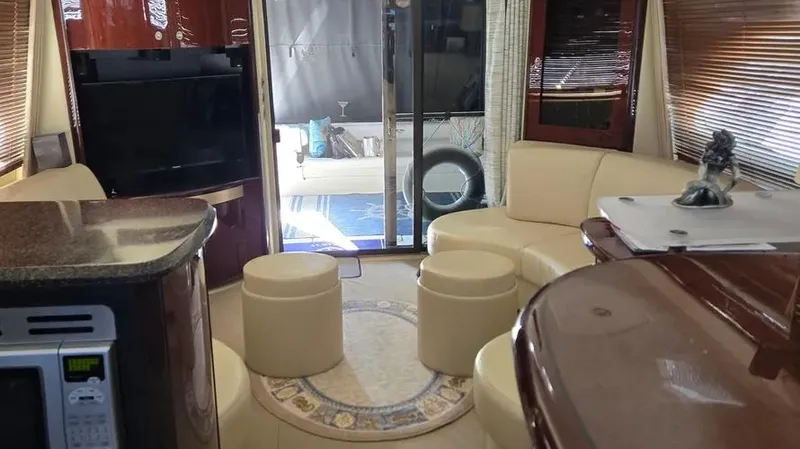  Yacht Photos Pics Luxurious 2007 Sea Ray 580 Sedan Bridge interior with elegant seating and modern amenities.