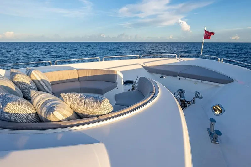 Kemosabe Yacht Photos Pics Luxurious 2007 Westport 112 yacht deck with plush seating and ocean view.