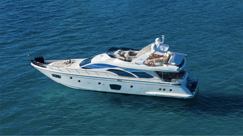  Yacht Photos Pics 2008 Azimut 75 yacht cruising on clear blue water.