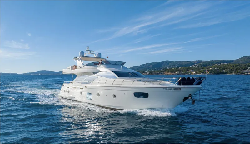  Yacht Photos Pics 2008 Azimut 75 yacht cruising on open water under clear blue skies.