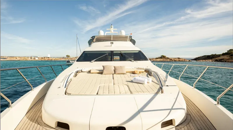  Yacht Photos Pics Luxury 2008 Azimut 75 yacht with sun deck, cruising on clear blue waters.