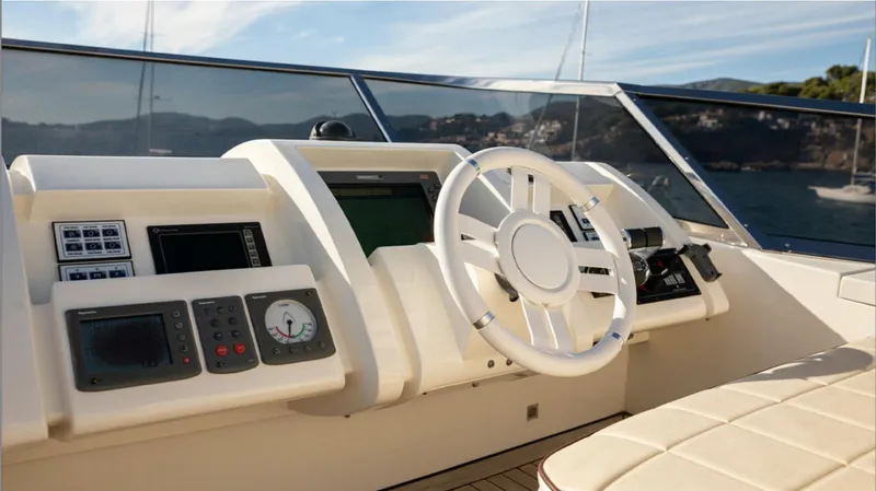  Yacht Photos Pics Helm of 2008 Azimut 75 yacht with modern navigation controls and steering wheel.