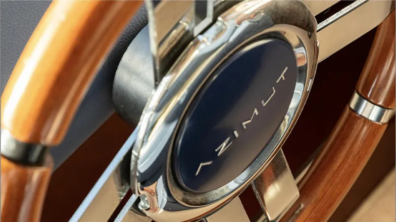  Yacht Photos Pics Close-up of 2008 Azimut 75 yacht steering wheel with wood and chrome details.