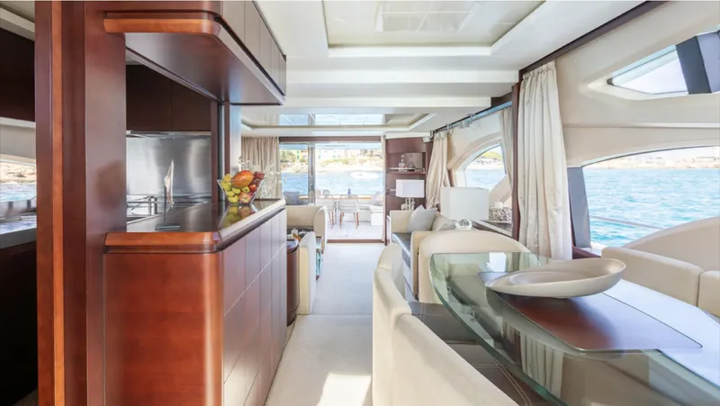  Yacht Photos Pics Luxurious interior of a 2008 Azimut 75 yacht with elegant wood finishes and ocean view.
