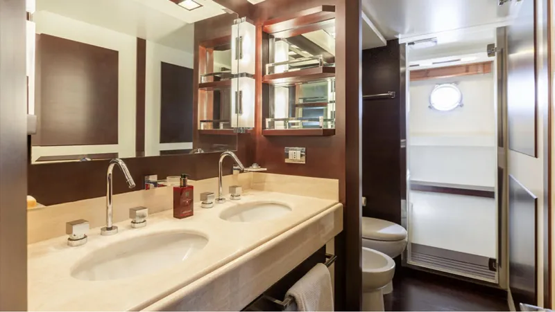  Yacht Photos Pics Luxurious bathroom in a 2008 Azimut 75 yacht with dual sinks and modern fixtures.