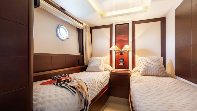  Yacht Photos Pics Luxurious twin cabin interior of 2008 Azimut 75 yacht with elegant bedding and lighting.