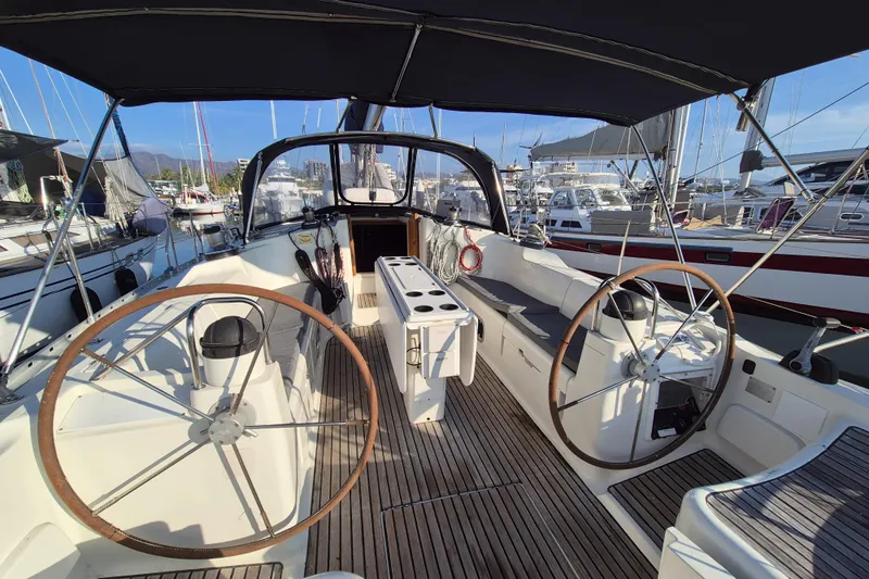 Time Warp Yacht Photos Pics Cockpit of 2000 Jeanneau Sun Odyssey 45.2 sailboat with dual steering wheels.