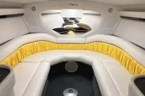  Yacht Photos Pics Interior of a 2002 Donzi 38 Daytona boat with white and yellow seating.