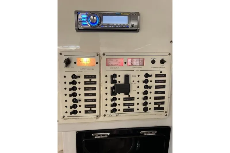  Yacht Photos Pics Control panel of a 2002 Donzi 38 Daytona boat with stereo system.