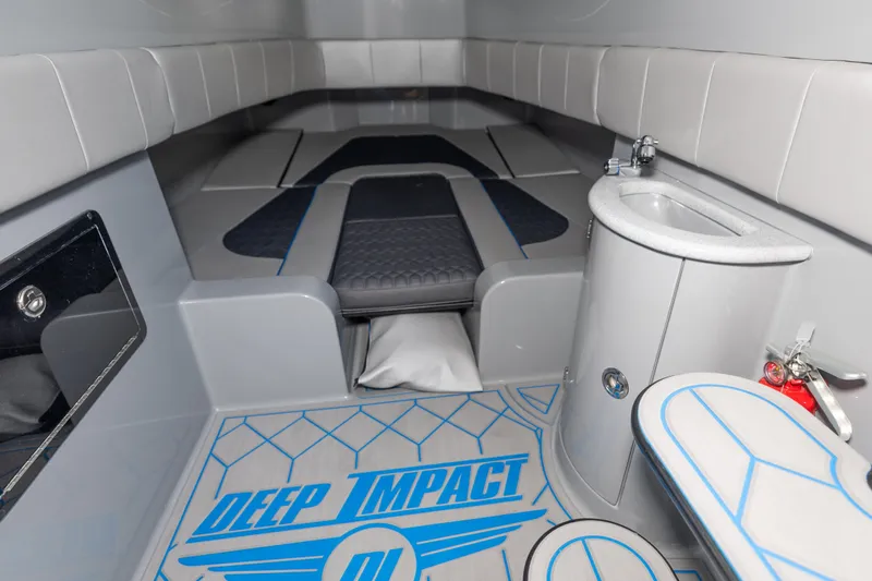  Yacht Photos Pics Interior of 2023 Deep Impact 399 Sport boat with modern seating and compact sink.