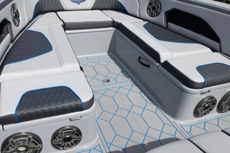  Yacht Photos Pics Luxurious interior of 2023 Deep Impact 399 Sport boat with stylish seating and speakers.