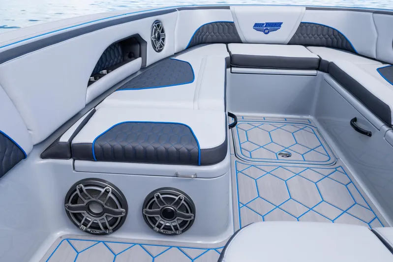  Yacht Photos Pics 2023 Deep Impact 399 Sport boat interior with stylish seating and modern speaker system.