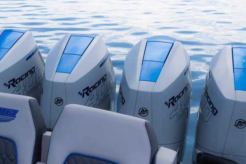  Yacht Photos Pics Four powerful outboard motors on a 2023 Deep Impact 399 Sport boat.