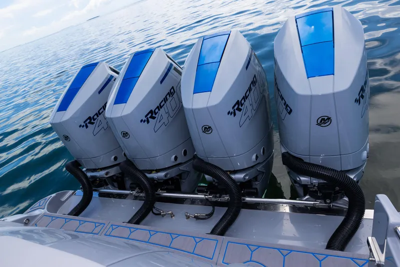  Yacht Photos Pics Four powerful outboard engines on a 2023 Deep Impact 399 Sport boat.