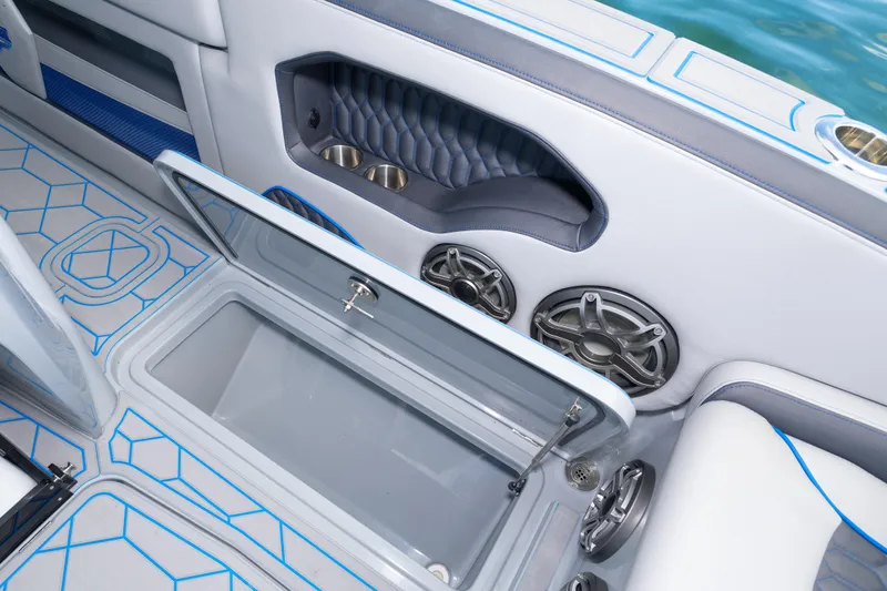  Yacht Photos Pics Interior of 2023 Deep Impact 399 Sport boat with storage and speakers.