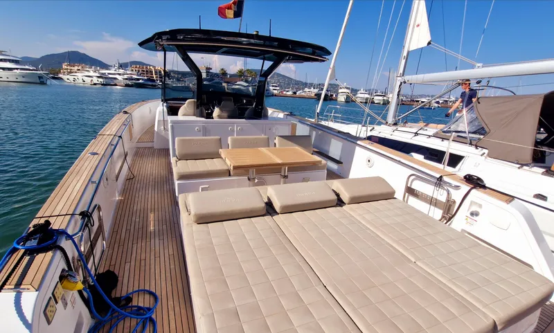  Yacht Photos Pics 2020 Pardo Yachts 43 with spacious deck and seating, docked in a marina.