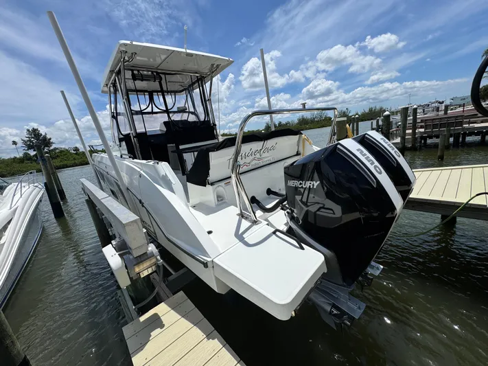  Yacht Photos Pics 2022 Beneteau Flyer 9 SUNdeck docked, featuring dual Mercury outboard engines.