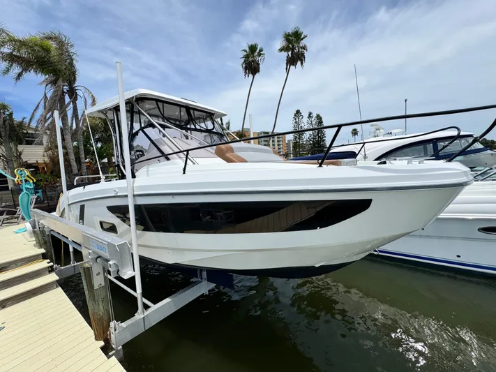  Yacht Photos Pics 2022 Beneteau Flyer 9 SUNdeck boat docked, showcasing sleek design and modern features.
