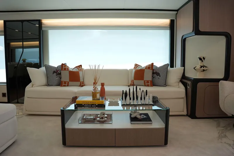 Geulunel Yacht Photos Pics Luxurious Majesty 120 yacht interior with elegant sofa, decorative pillows, and modern coffee table, 2025 model.