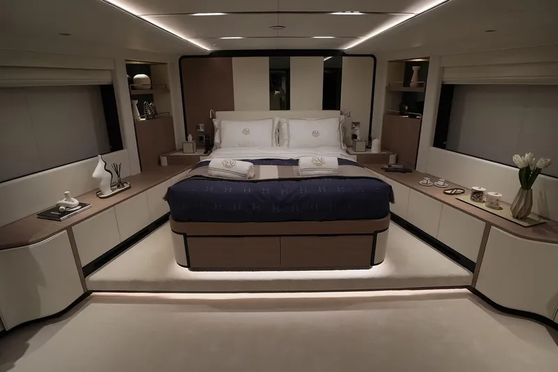 Geulunel Yacht Photos Pics Luxurious bedroom interior of 2025 Majesty 120 yacht, featuring elegant design and modern amenities.
