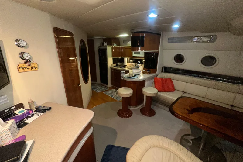  Yacht Photos Pics Luxurious interior of a 1998 Sea Ray 500 Sundancer yacht with modern amenities.