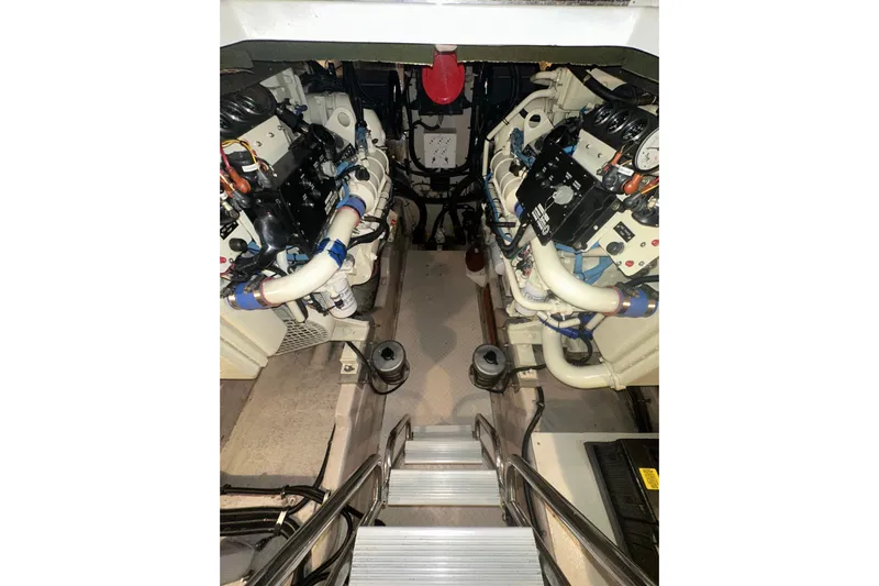  Yacht Photos Pics Engine room of 1998 Sea Ray 500 Sundancer with visible machinery and components.