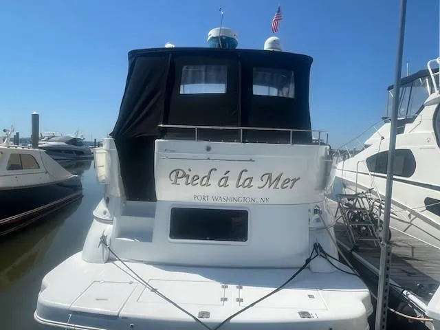  Yacht Photos Pics 2000 Cruisers Yachts 4450 Express Motoryacht docked, named "Pied á la Mer," Port Washington, NY.